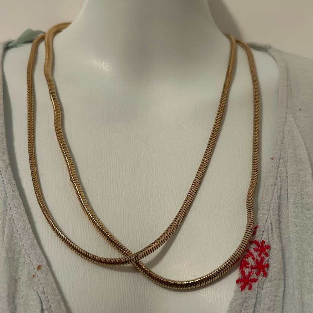 Gold tone snake necklace